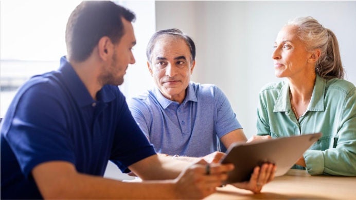 Male patient and partner with healthcare provider
