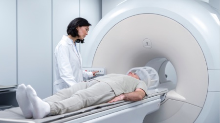 Doctor with patient before MRI scan