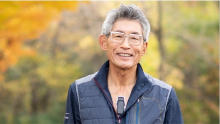 Smiling older man enjoying the outdoors while wearing BodyGuardian