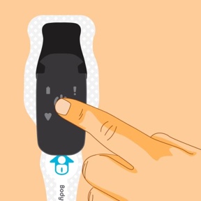Close-up of finger turning on BodyGuardian by pressing the centre button