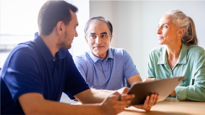 Male patient and partner with healthcare provider